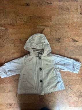 Little Earthling Baby Hooded Jacket in Light Beige with Bicycle Print